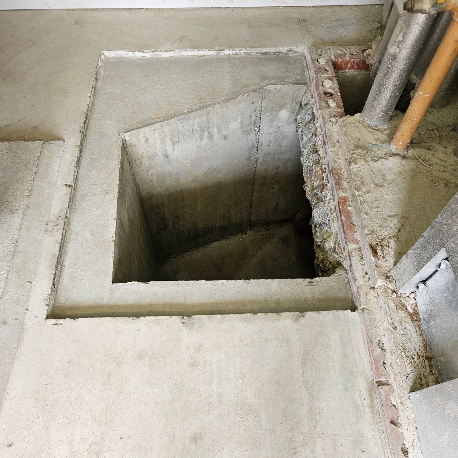Finished reinforced concrete inspection pit at Watts Gallery, Guildford