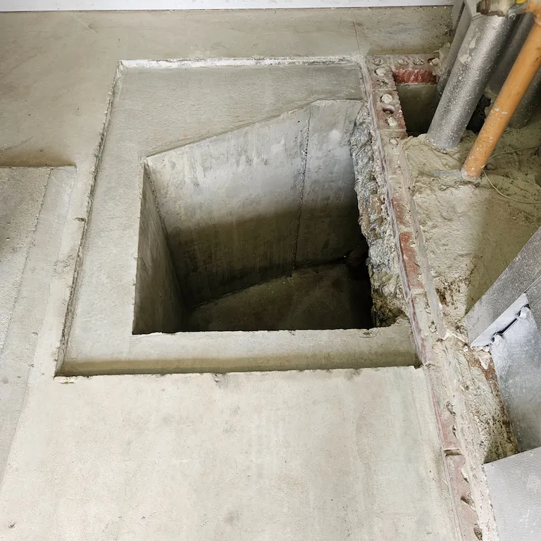 Finished reinforced concrete inspection pit at Watts Gallery, Guildford
