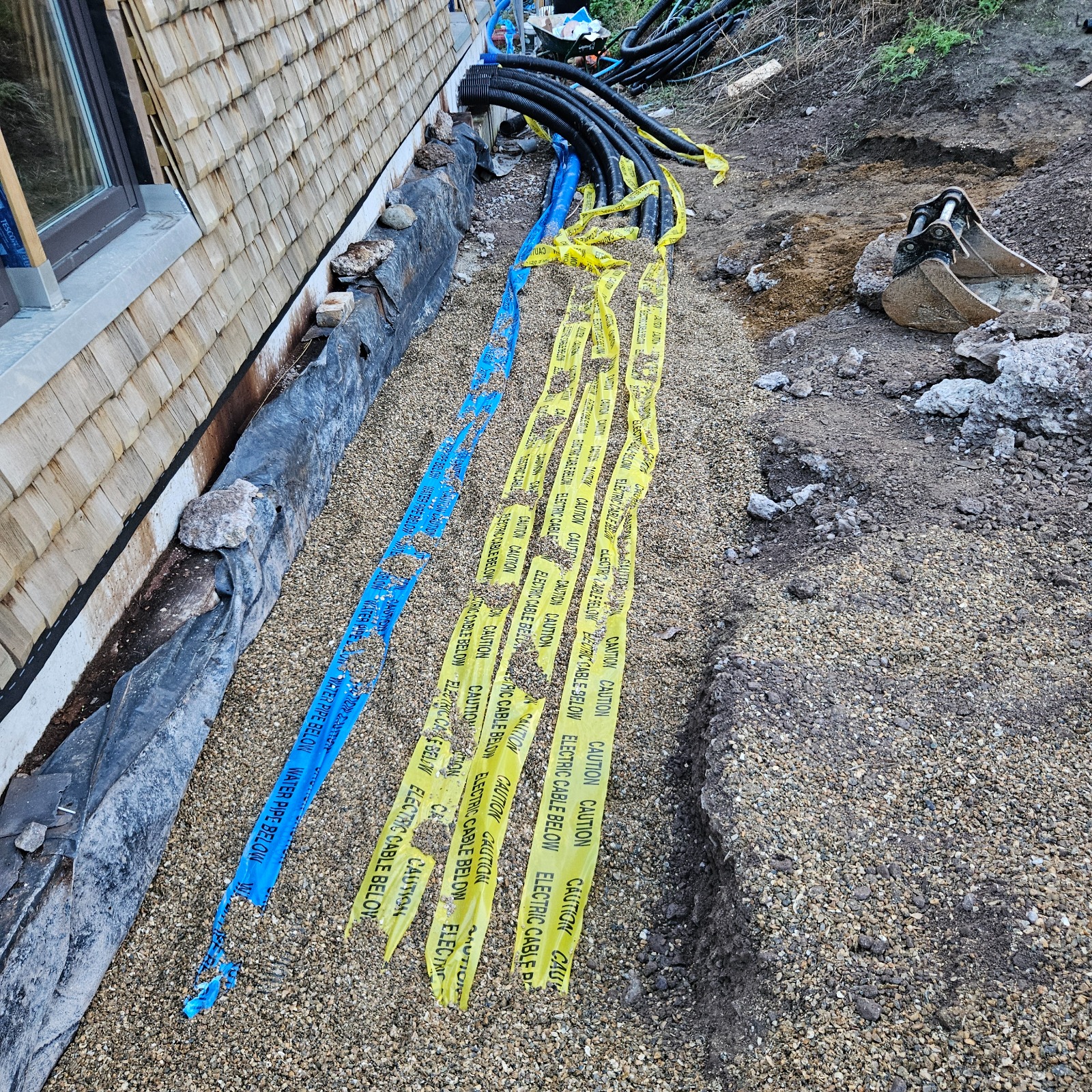 Ducting installed alongside finished buildings with delicate cladding